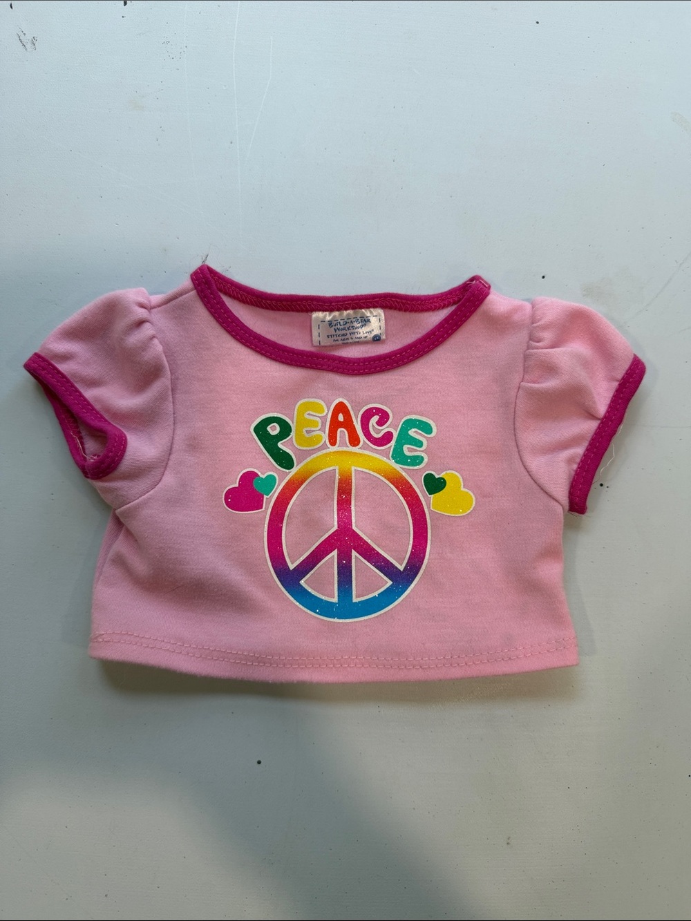 Build-a-bear pink peace sign shirt